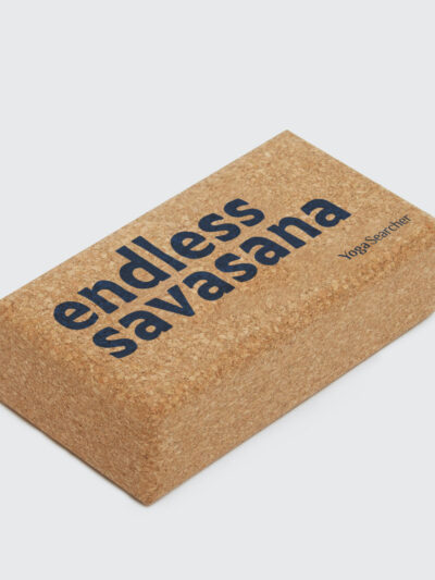 Cork yoga block with blue 'Endless Savasana' text by Yoga Searcher
