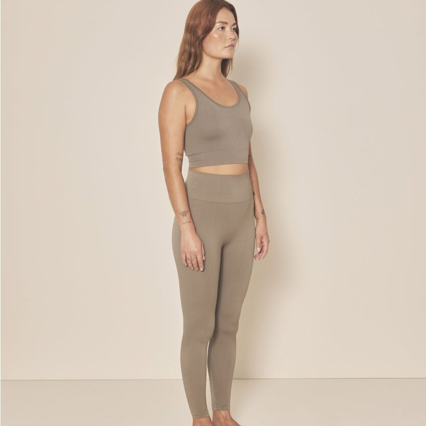 Woman wearing a beige sportswear set