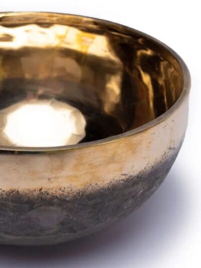 Golden metal Tibetan singing bowl