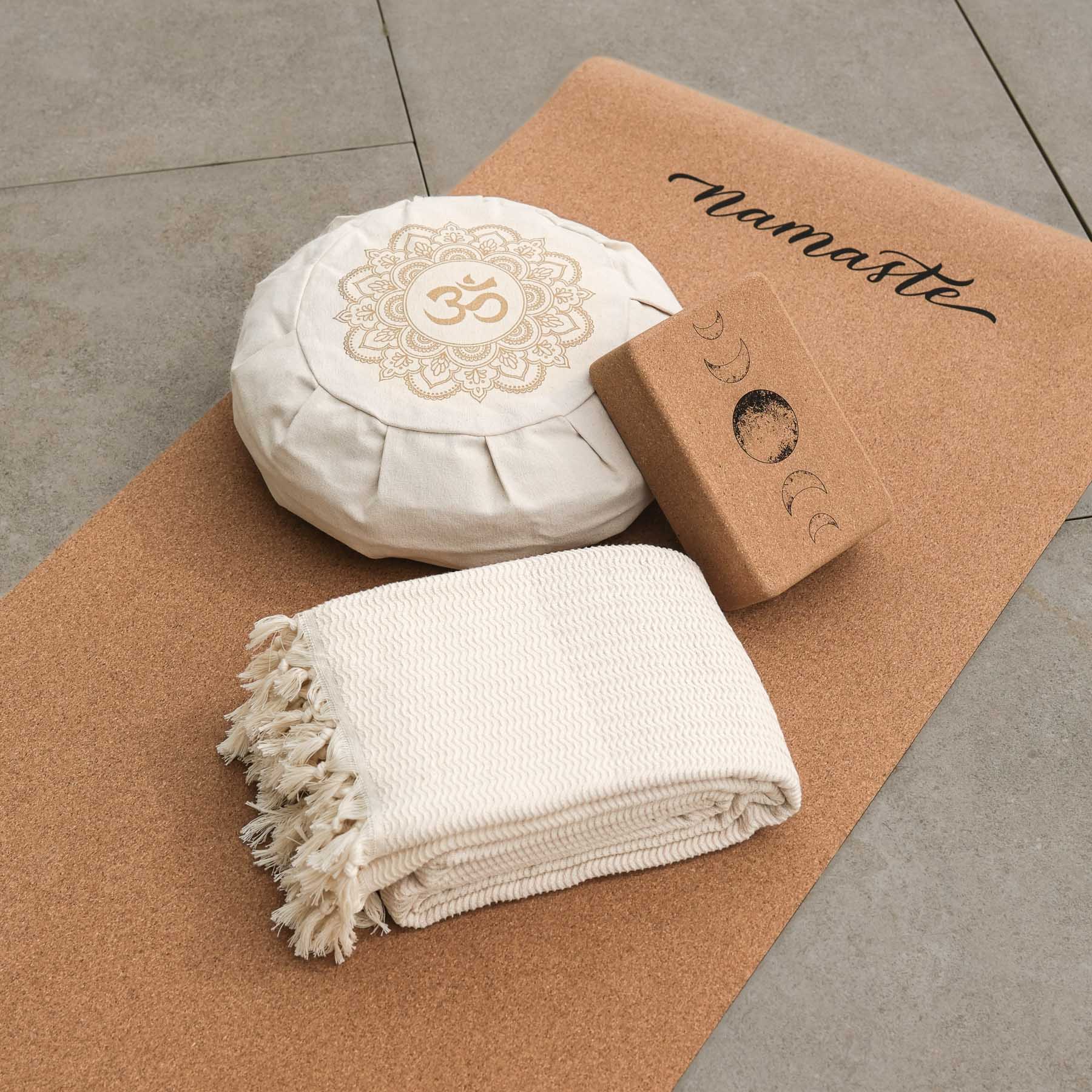 Yoga accessories on cork mat