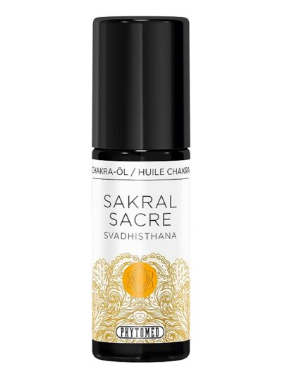 Dark glass bottle of sacral chakra massage oil by Phytomed