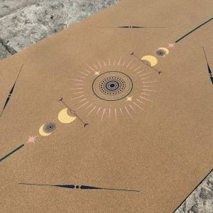 Yoga mat with sun and moon patterns.