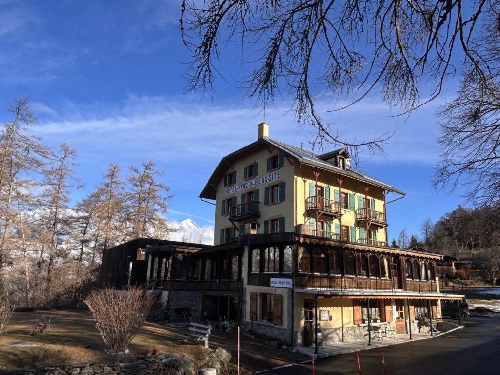 Beausite alpine hotel with snow-covered mountain