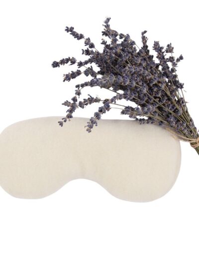 Bouquet of dried lavender on beige cushion