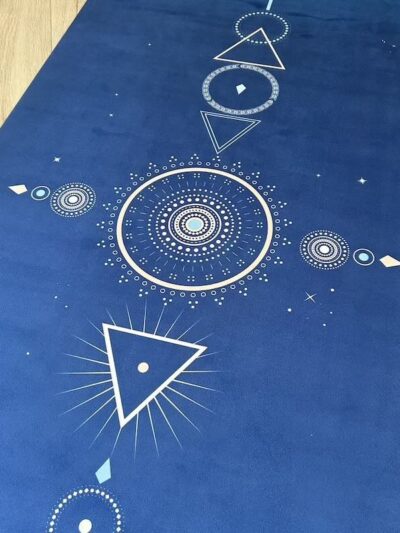 Blue yoga mat with geometric pattern