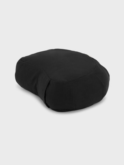 Half-moon-shaped meditation and yoga cushion in dark brown